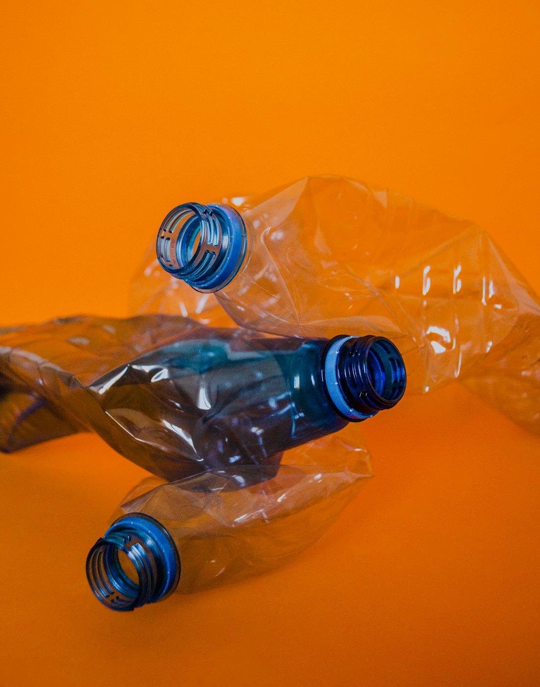 Clear PET bottles with blue caps